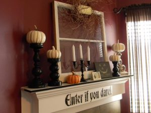 house-decoration-red-wall-paint-halloween-mantel-decoration-with-white-mantel-fireplace-and-black-candle-stick-also-white-pumpkins-12-images-halloween-mantel-decoration